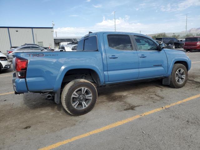 3TMAZ5CN1KM101188 - 2019 TOYOTA TACOMA DOUBLE CAB Синий фото 5