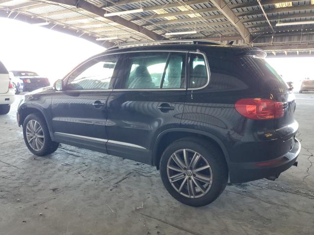 WVGBV7AX5CW571608 - 2012 VOLKSWAGEN TIGUAN S BLACK photo 2