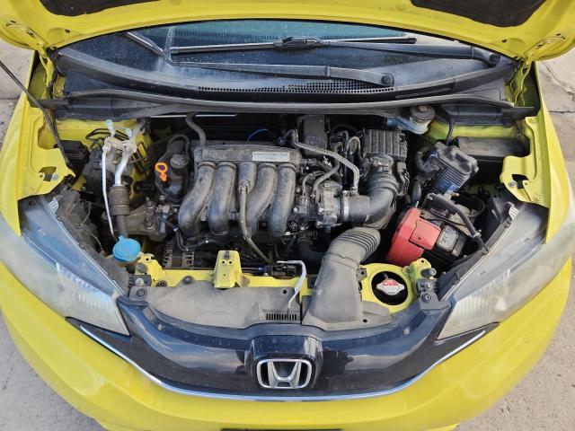 JHMGK5H76GX040056 - 2016 HONDA FIT EX YELLOW photo 11