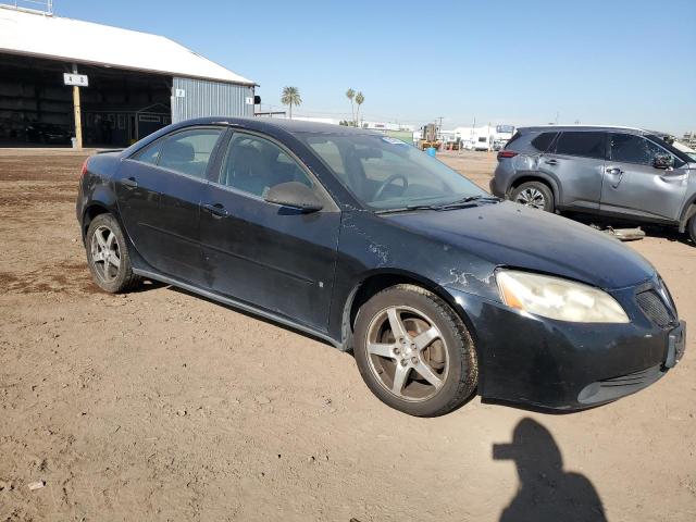 1G2ZG58NX74260624 - 2007 PONTIAC G6 BASE BLACK photo 4