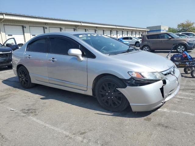 2HGFA16579H518617 - 2009 HONDA CIVIC LX SILVER photo 4