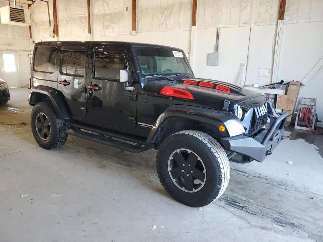 1C4BJWEG4CL269670 - 2012 JEEP WRANGLER U SAHARA أسود صورة 4