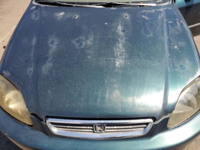 1HGEJ6622TL024285 - 1996 HONDA CIVIC DX GREEN photo 11