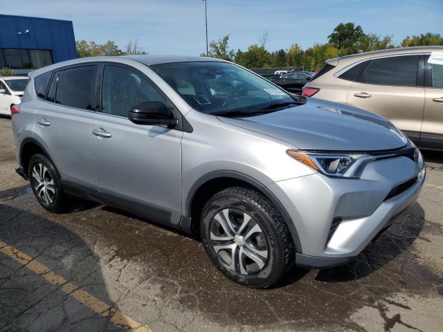 2T3ZFREV3HW389755 - 2017 TOYOTA RAV4 LE SILVER photo 4
