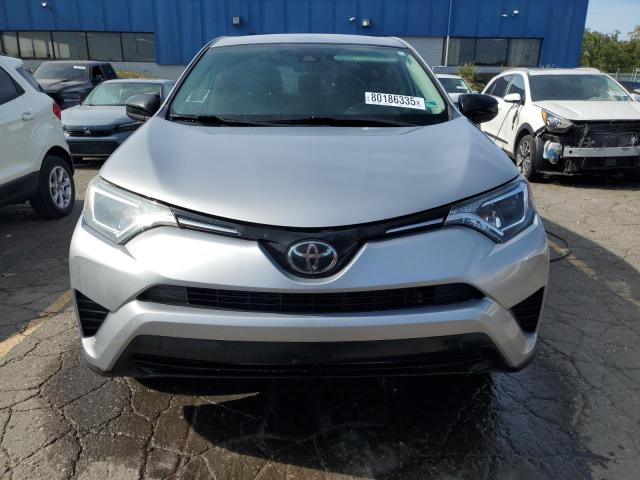 2T3ZFREV3HW389755 - 2017 TOYOTA RAV4 LE SILVER photo 5