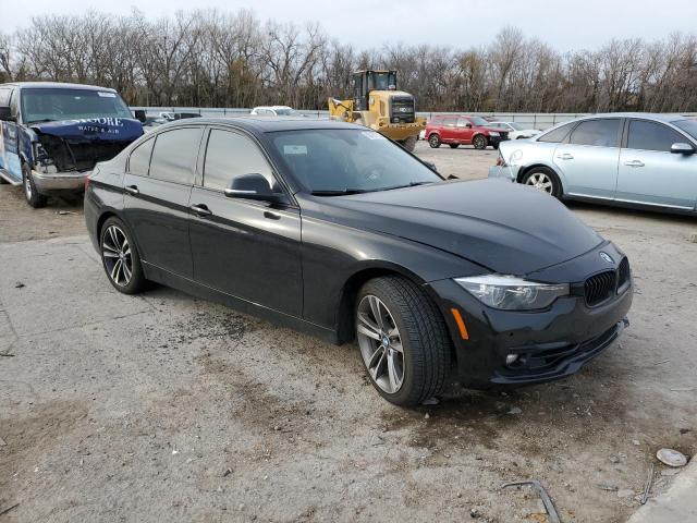 WBA8B9C57JEE81135 - 2018 BMW 330 I BLACK photo 4