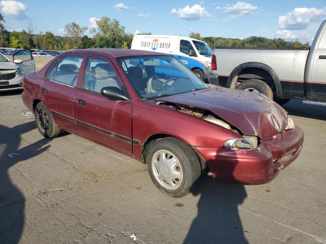 1Y1SK5483YZ404526 - 2000 CHEVROLET GEO PRIZM BASE RED photo 4