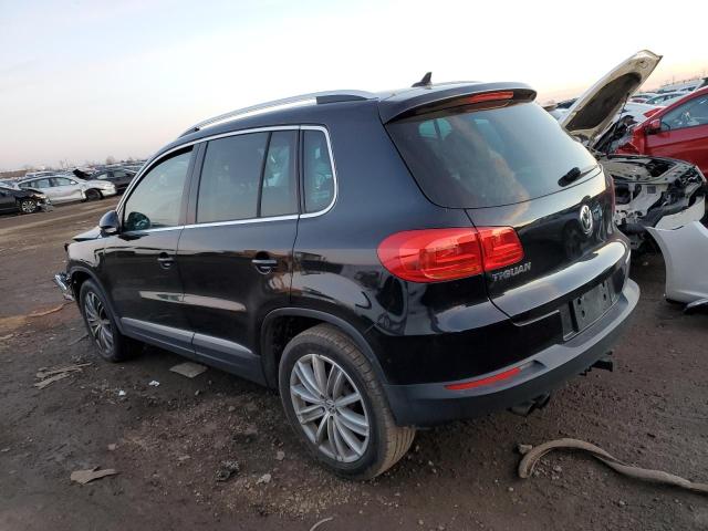 WVGAV7AX9CW539398 - 2012 VOLKSWAGEN TIGUAN S BLACK photo 2