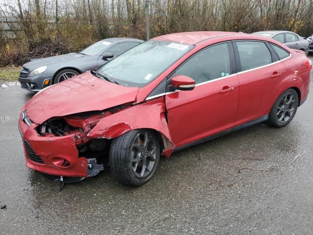 1FAHP3J29CL302413 - 2012 FORD FOCUS TITANIUM RED photo 1