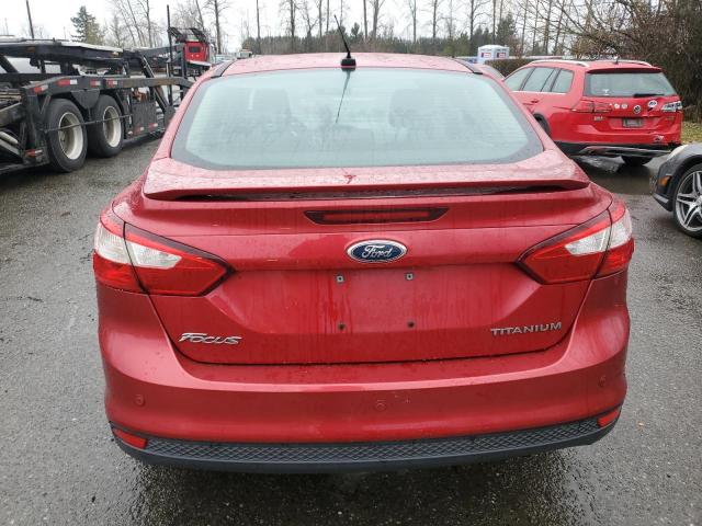 1FAHP3J29CL302413 - 2012 FORD FOCUS TITANIUM RED photo 6