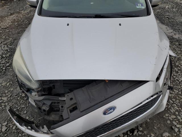 1FADP3K2XFL223253 - 2015 FORD FOCUS SE SILVER photo 11