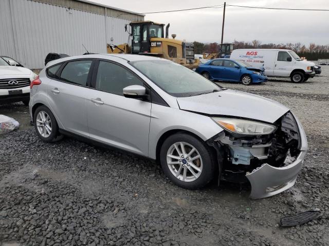 1FADP3K2XFL223253 - 2015 FORD FOCUS SE SILVER photo 4