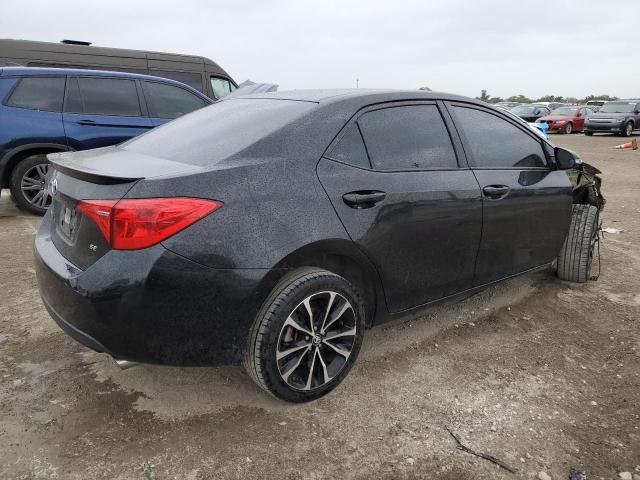 5YFBURHE0KP890574 - 2019 TOYOTA COROLLA L BLACK photo 3