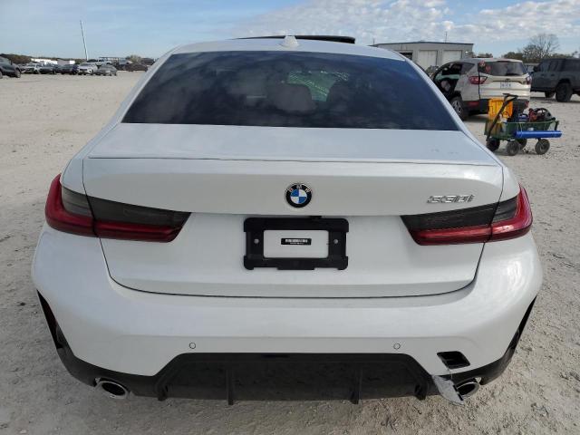 3MW69FF01P8D31161 - 2023 BMW 330I WHITE photo 6