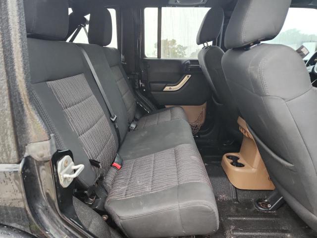 1J4HA5H10BL530149 - 2011 JEEP WRANGLER U SAHARA BLACK photo 11