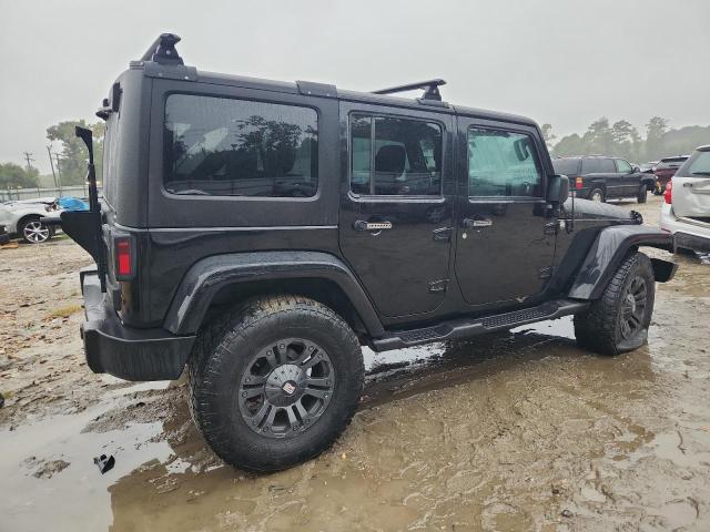 1J4HA5H10BL530149 - 2011 JEEP WRANGLER U SAHARA BLACK photo 3