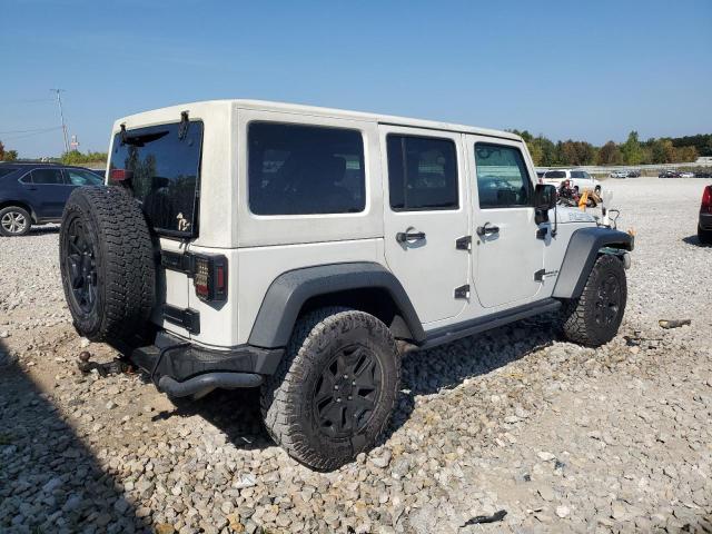 1C4BJWEG6DL602341 - 2013 JEEP WRANGLER U SAHARA WHITE photo 3