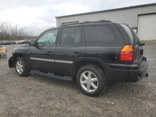 1GKDT13S882209535 - 2008 GMC ENVOY Schwarz Foto 2