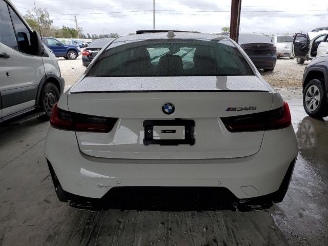 3MW49FS01P8D77716 - 2023 BMW M340I WHITE photo 6