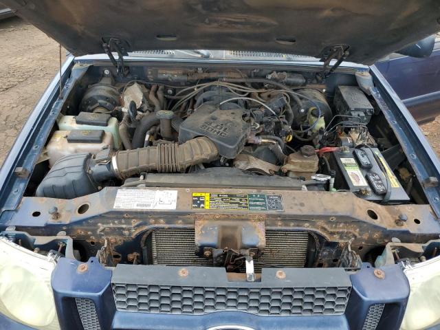 1FMZU67E03UC22191 - 2003 FORD EXPLORER S BLUE photo 11