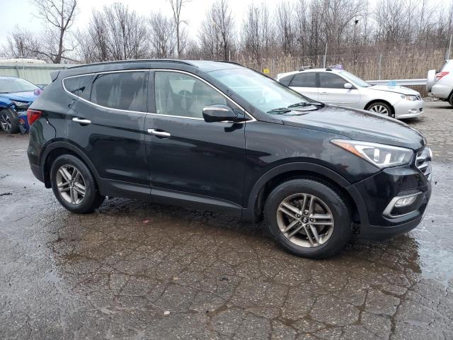 5NMZUDLB7JH088014 - 2018 HYUNDAI SANTA FE S BLACK photo 4