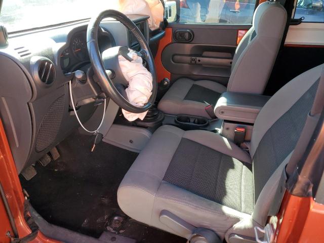 1J4FA24129L734571 - 2009 JEEP WRANGLER X ORANGE photo 7