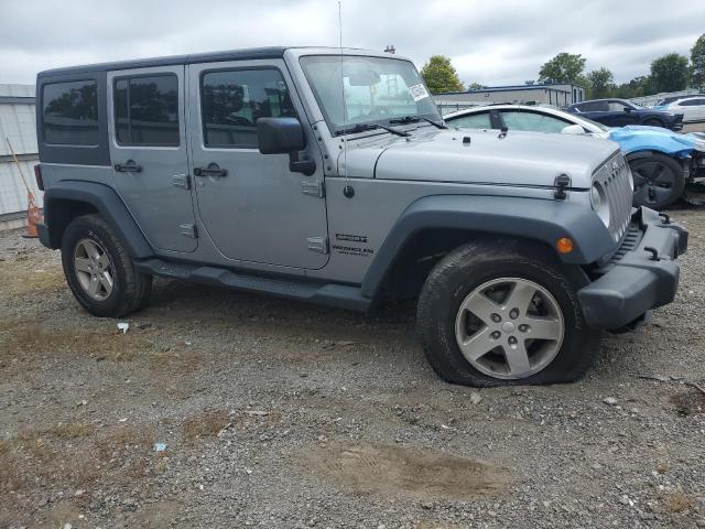 1C4HJWDG5GL260025 - 2016 JEEP WRANGLER U SPORT Argent photo 4