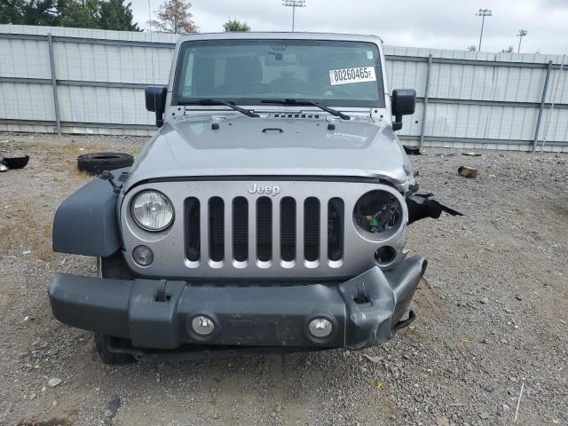 1C4HJWDG5GL260025 - 2016 JEEP WRANGLER U SPORT Argent photo 5