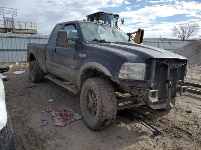 1FTWX31P15EA47602 - 2005 FORD F350 SRW SUPER DUTY BLACK photo 4