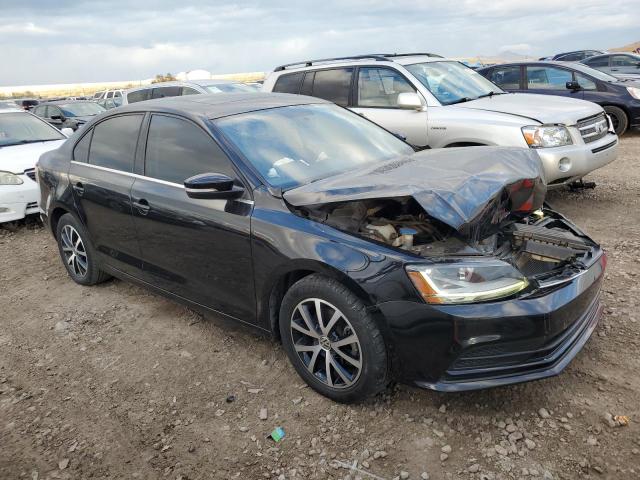 3VWDB7AJ0HM361861 - 2017 VOLKSWAGEN JETTA SE BLACK photo 4