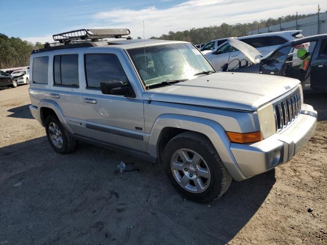 1J8HH48K97C697260 - 2007 JEEP COMMANDER BLACK photo 4