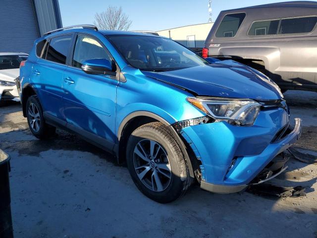 JTMRFREV8JJ255764 - 2018 TOYOTA RAV4 ADVENTURE BLUE photo 4