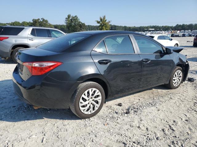 5YFBURHE7KP859242 - 2019 TOYOTA COROLLA L შავი ფოტო 3