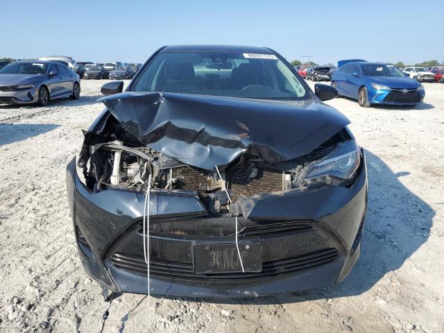 5YFBURHE7KP859242 - 2019 TOYOTA COROLLA L შავი ფოტო 5