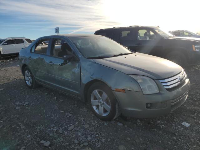 3FAHP07Z78R139160 - 2008 FORD FUSION SE TEAL photo 4