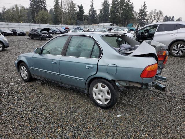 2HGEJ8648XH587437 - 1999 HONDA CIVIC EX BLUE photo 2