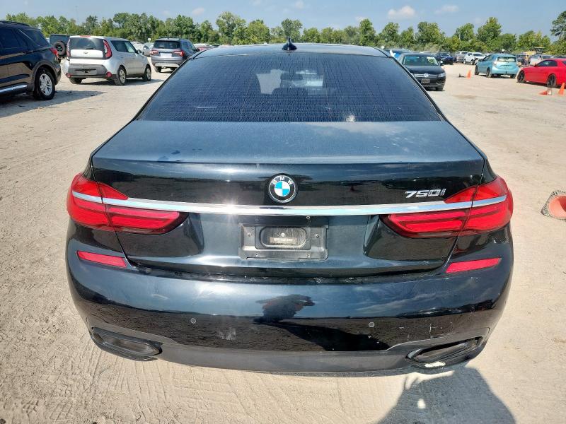WBA7F0C53GGL99358 - 2016 BMW 750 I Чорний фото 6