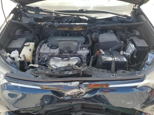 JTMZFREV5JJ159557 - 2018 TOYOTA RAV4 LE ლურჯი ფოტო 12