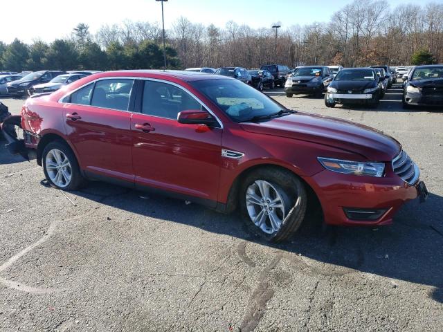 1FAHP2H89HG110090 - 2017 FORD TAURUS SEL RED photo 4