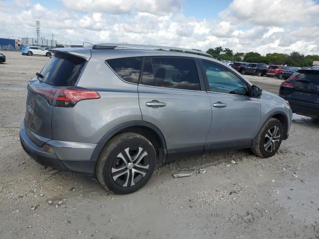 2T3ZFREV8GW246766 - 2016 TOYOTA RAV4 LE SILVER photo 3
