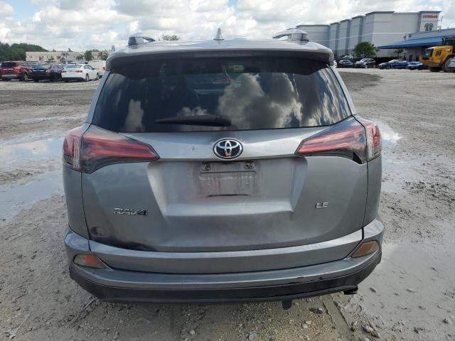 2T3ZFREV8GW246766 - 2016 TOYOTA RAV4 LE SILVER photo 6