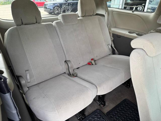 5TDKK3DC2CS206057 - 2012 TOYOTA SIENNA LE GREEN photo 7