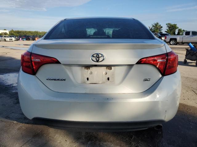 5YFBURHE2JP827331 - 2018 TOYOTA COROLLA L WHITE photo 6