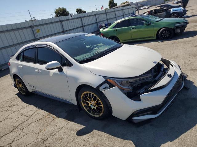 5YFP4MCE0MP093387 - 2021 TOYOTA COROLLA SE WHITE photo 4