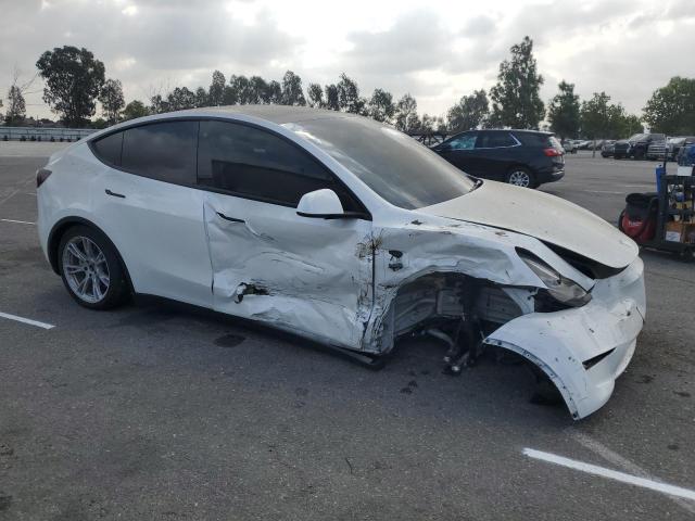 7SAYGDEE5PA035557 - 2023 TESLA MODEL Y Blanco foto 4