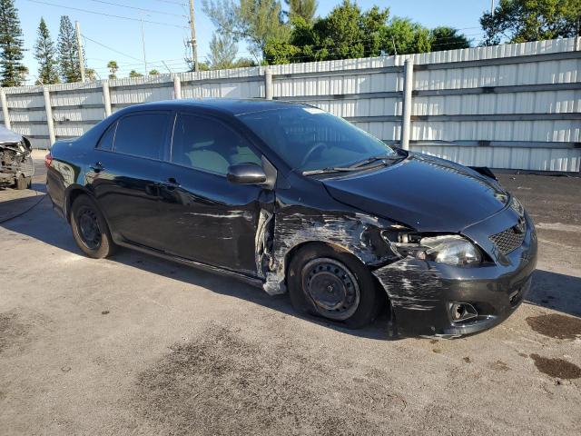 1NXBU4EEXAZ334471 - 2010 TOYOTA COROLLA BASE Schwarz Foto 4