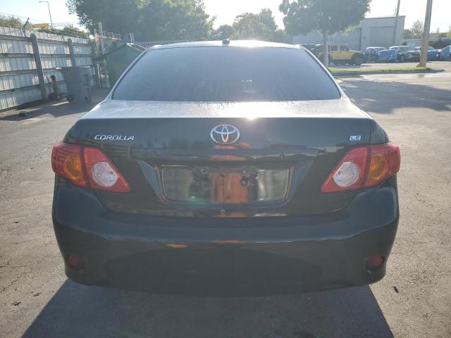 1NXBU4EEXAZ334471 - 2010 TOYOTA COROLLA BASE Schwarz Foto 6