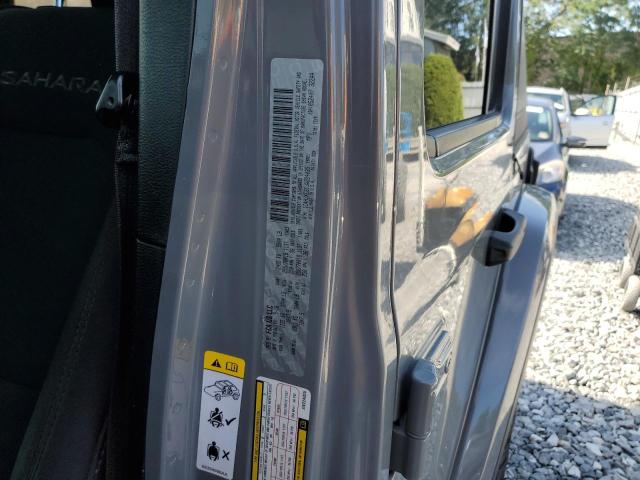 1C4HJXEG1JW224035 - 2018 JEEP WRANGLER U SAHARA GRAY photo 12