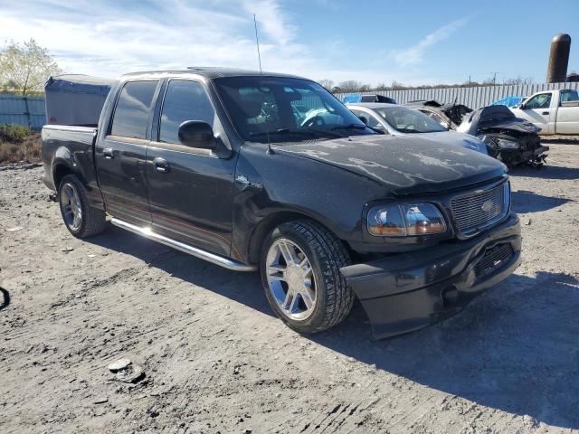 1FTRW07L51KA83050 - 2001 FORD F150 SUPERCREW BLACK photo 4