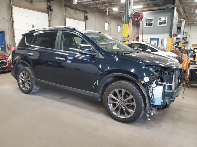 JTMDFREV4JJ220486 - 2018 TOYOTA RAV4 LIMITED ლურჯი ფოტო 4